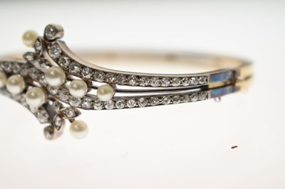 Lot 34 - Late 19th / early 20th century diamond and pearl hinged bangle