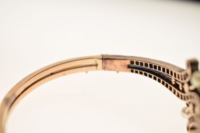 Lot 34 - Late 19th / early 20th century diamond and pearl hinged bangle