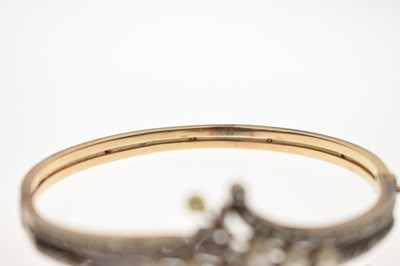 Lot 34 - Late 19th / early 20th century diamond and pearl hinged bangle