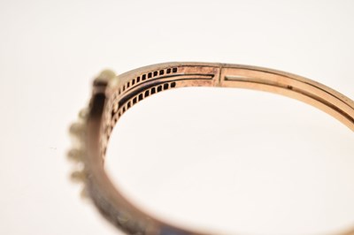 Lot 34 - Late 19th / early 20th century diamond and pearl hinged bangle