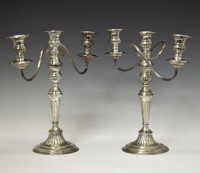 Lot 191 - Pair of 20th century Elkington silver plated twin branch, three light candelabra