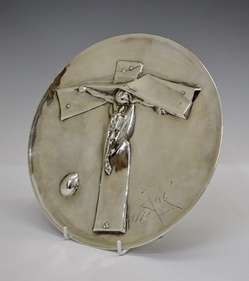 Lot 108 - After Salvador Dali (1904-89), a white metal plate depicting the 'Easter Christ'