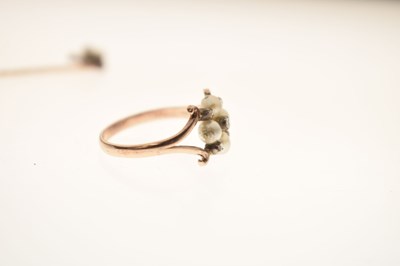 Lot 38 - 19th century pearl and diamond ring plus similar stick pin (2)
