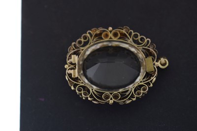 Lot 25 - 19th century cannetille rock crystal pendant