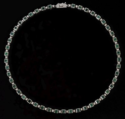 Lot 31 - Emerald and diamond 18ct white gold 'tennis' style necklace