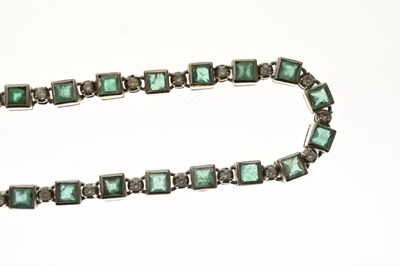 Lot 35 - Emerald and diamond 18ct white gold 'tennis' style necklace