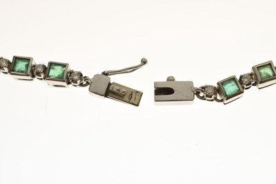 Lot 35 - Emerald and diamond 18ct white gold 'tennis' style necklace
