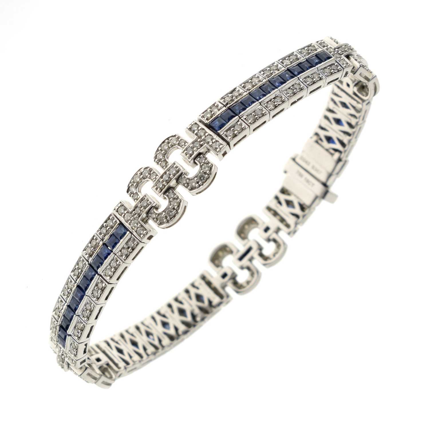 Lot 33 - Sapphire and diamond 18ct white gold bracelet