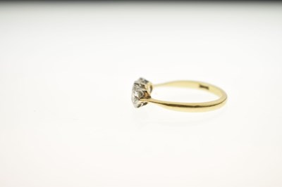 Lot 10 - 18ct gold and three stone diamond ring