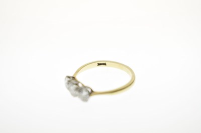 Lot 10 - 18ct gold and three stone diamond ring