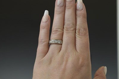Lot 13 - Diamond 18ct white gold half eternity ring
