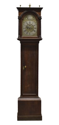 Lot 668 - Early to mid 18th century oak-cased 8-day brass dial longcase clock, signed "James Delaunce, Frome"