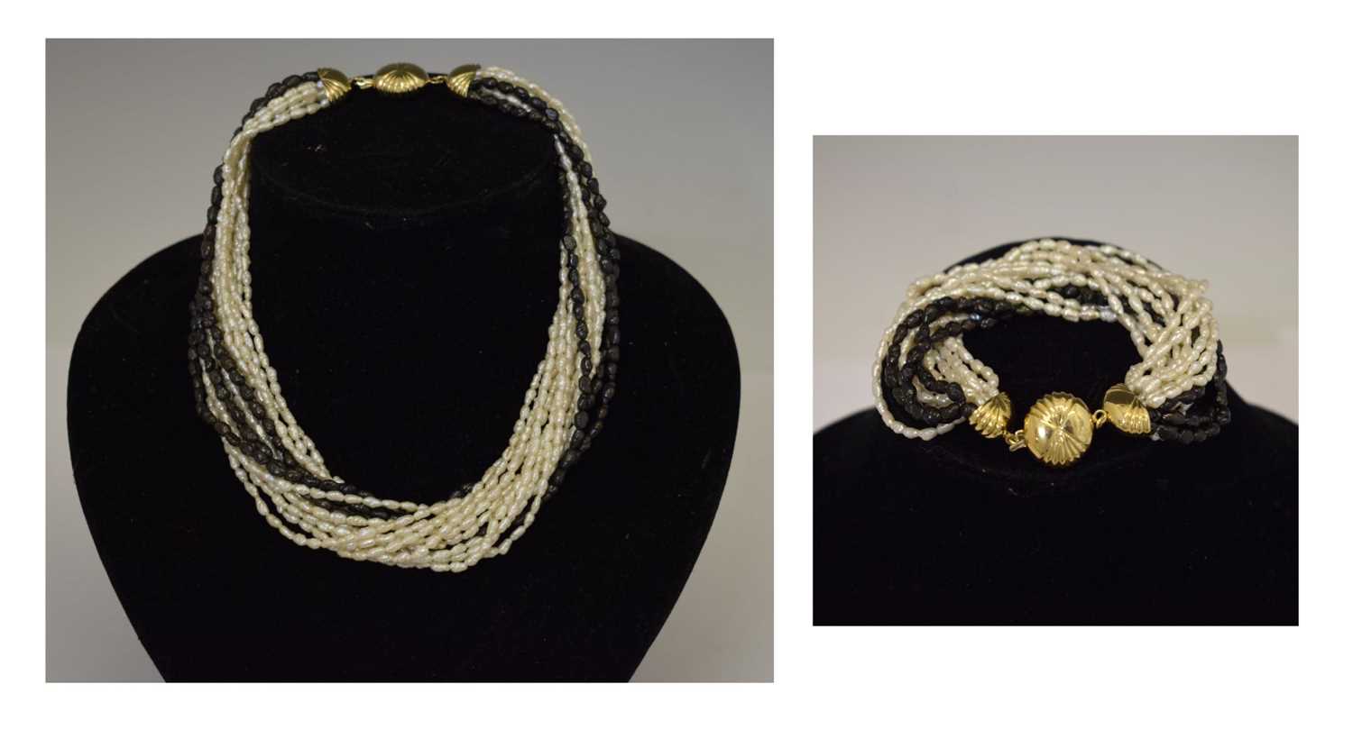 Lot 37 - Freshwater pearl yellow metal necklace and matching bracelet set