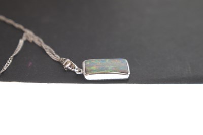 Lot 27 - Opal white metal pendant