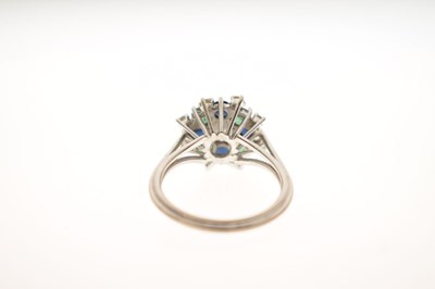 Lot 17 - Diamond, sapphire and emerald unmarked white metal cluster ring