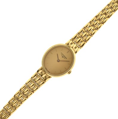 Lot 67 - Longines – Lady’s 18ct gold bracelet watch