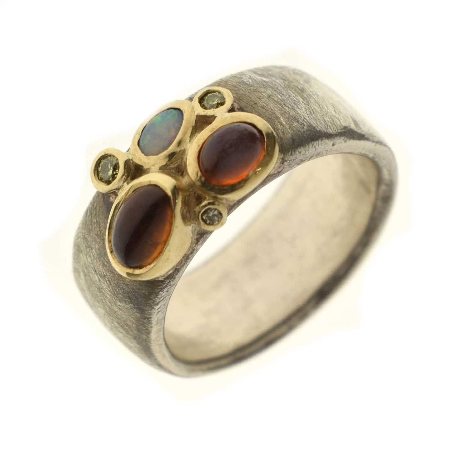 Lot 45 - Julia Beusch - Diamond and opal silver ring