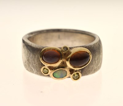 Lot 45 - Julia Beusch - Diamond and opal silver ring