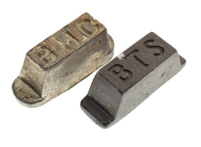Lot 150 - Poured white metal ingot stamped 'BMC'  and another stamped BTS