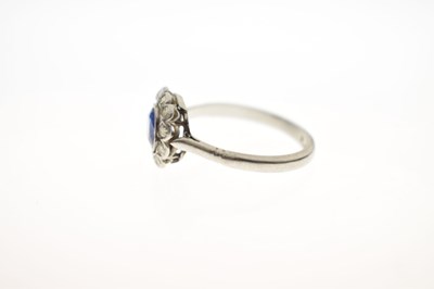 Lot 18 - Sapphire and diamond platinum cluster ring