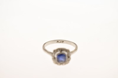 Lot 18 - Sapphire and diamond platinum cluster ring
