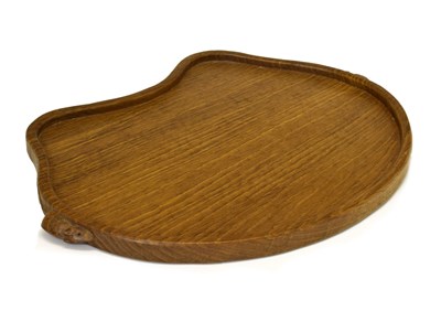 Lot 465 - Workshop of Robert 'Mouseman' Thompson, late 20th century English oak kidney-shaped tray