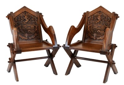 Lot 574 - Pair of  19th Century carved oak 'Glastonbury' chairs