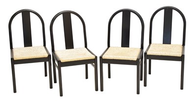 Lot 653 - Four Habitat rush-seated ebonised chairs