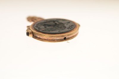 Lot 41 - Late Georgian unmarked yellow metal and bloodstone swivel fob seal