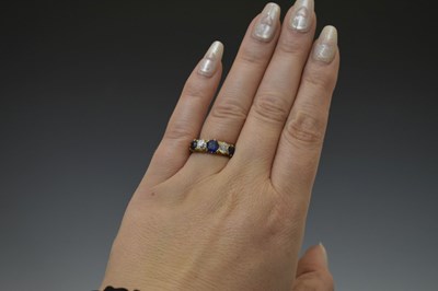 Lot 19 - 18ct gold, sapphire and diamond five-stone ring