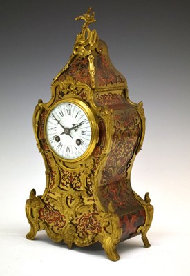 Lot 540 - Late 19th Century French red boulle mantel clock