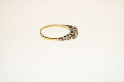 Lot 8 - Diamond yellow gold three-stone diamond ring