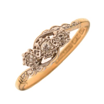 Lot 67 - Illusion set diamond three-stone crossover ring