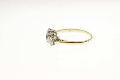 Lot 9 - Diamond 18ct yellow and white gold set three-stone ring