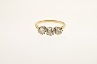 Lot 9 - Diamond 18ct yellow and white gold set three-stone ring