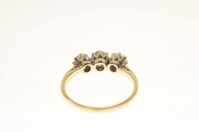 Lot 9 - Diamond 18ct yellow and white gold set three-stone ring