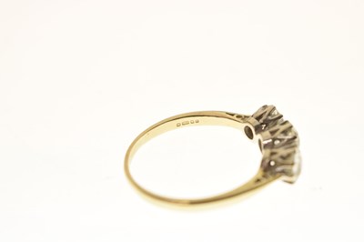 Lot 9 - Diamond 18ct yellow and white gold set three-stone ring
