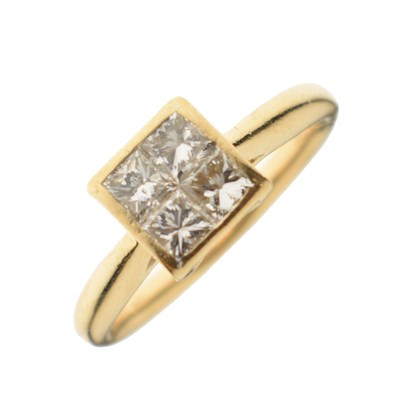 Lot 69 - 18ct gold four-stone diamond ring