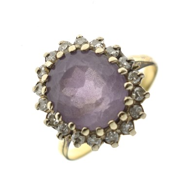 Lot 71 - Amethyst and diamond cluster yellow metal ring