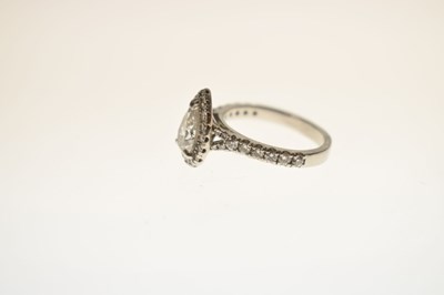 Lot 6 - Diamond pear shaped platinum halo ring with certificate