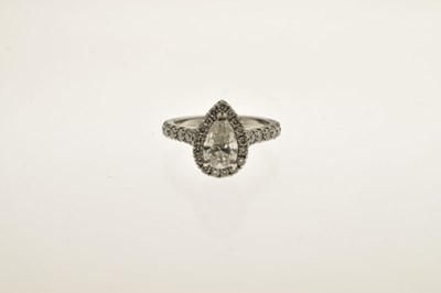 Lot 6 - Diamond pear shaped platinum halo ring with certificate