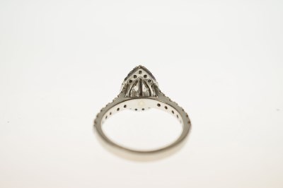 Lot 6 - Diamond pear shaped platinum halo ring with certificate