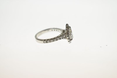 Lot 6 - Diamond pear shaped platinum halo ring with certificate