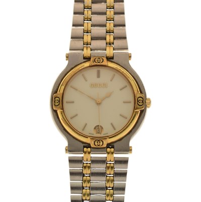 Lot 242 - Gucci - Two-tone stainless steel bracelet watch, ref. 9000 M