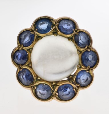 Lot 23 - Moonstone and sapphire 9ct gold cluster ring