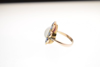 Lot 23 - Moonstone and sapphire 9ct gold cluster ring