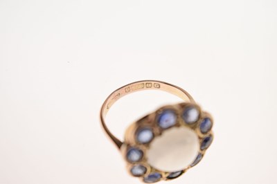 Lot 23 - Moonstone and sapphire 9ct gold cluster ring