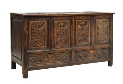 Lot 443 - Early George III carved oak mule chest