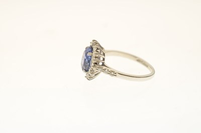 Lot 20 - Sapphire and diamond platinum cluster ring