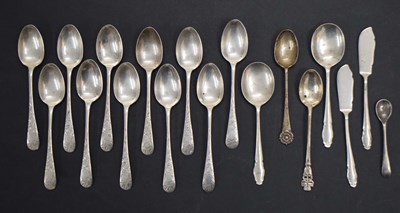 Lot 238 - Set of eleven Victorian teaspoons with decorated handles